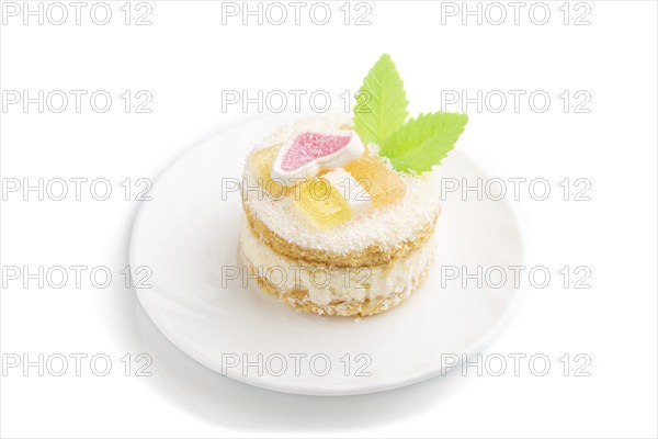 Decorated cake with milk and coconut cream isolated on white background. Side view, close up