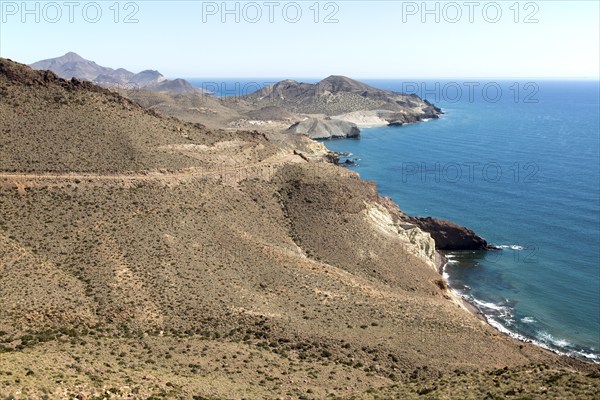 Coastal landscape Cabo de Gata natural park, looking east towards San Jose, Almeria, Spain, Europe