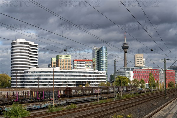 Skyline Düsseldorf Media Harbour, Rhine Tower, S-Bahn station, Düsseldorf-Hamm stop, local train,