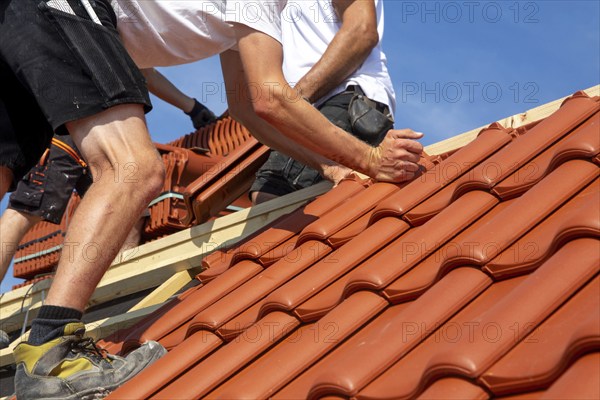 Roofing work, re-roofing of a tiled roof
