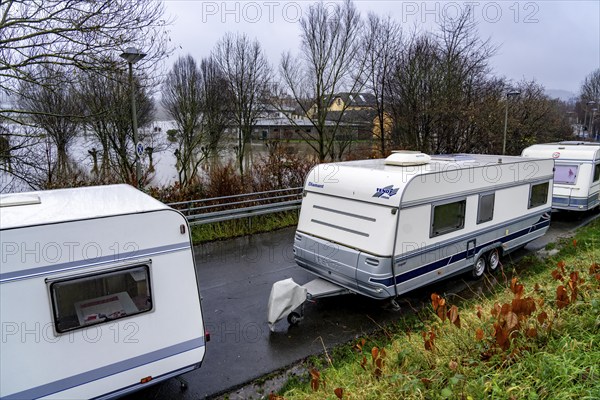 Flood on the Ruhr, here near Hattingen, caravans pulled into the dry at a flooded campsite, flooded