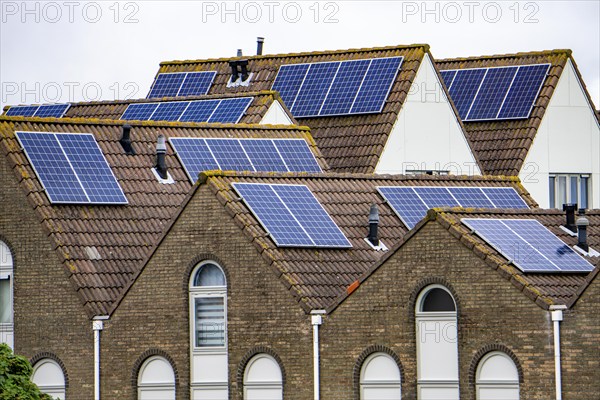 Solar modules on roofs, on pitched roofs of residential buildings, Vlissingen, Netherlands