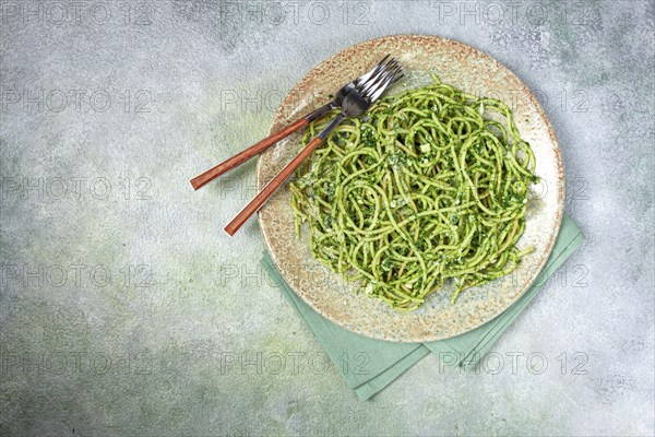 Spaghetti with pesto sauce, homemade, no people