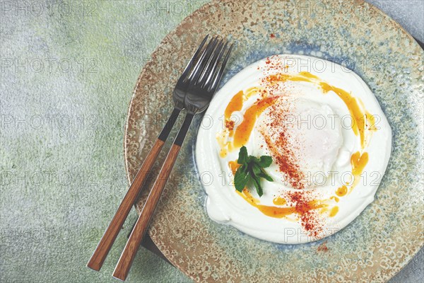 ?ilbir, traditional Turkish breakfast, Turkish eggs with yogurt and butter, homemade, no people