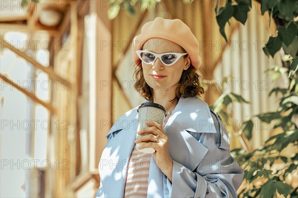 Urban portrait of cute modern stylish woman