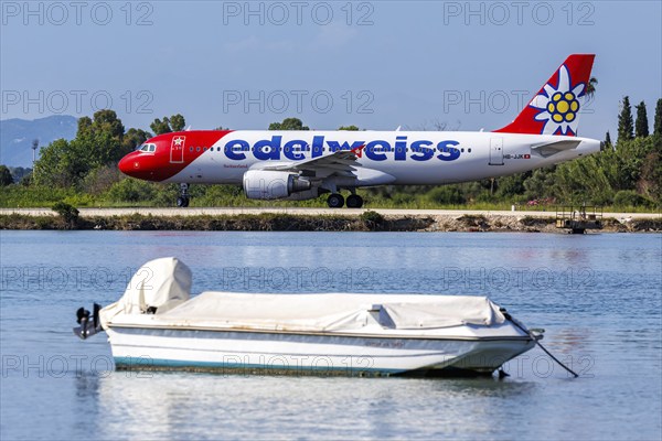 An Edelweiss Airbus A320 aircraft with the registration HB-JJK at Corfu Airport, Greece, Europe