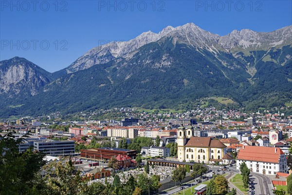 View of Innsbruck with the parish church and basilica Mariae Empfängnis, Wilten cemetery and the