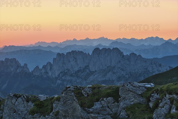Fribourg Prealps with Gastlosen mountain range at dawn, Bernese Alps behind, cantons of Fribourg