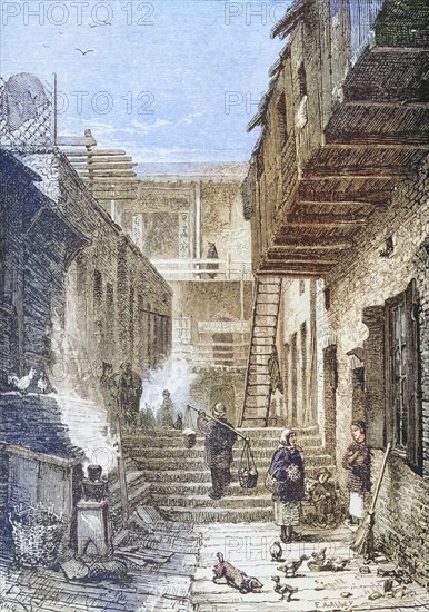 View of Chinatown in San Francisco, California in the 1870s. From American Pictures Drawn With Pen