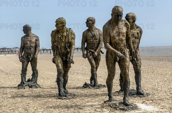 'Walking Men' artwork bronze sculptures by Laurence Edwards, South Beach, Lowestoft, Suffolk,