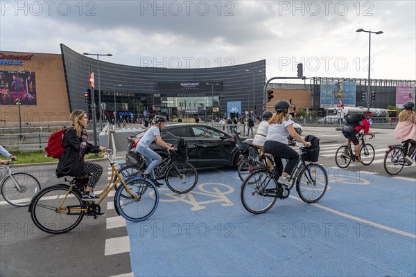 Cyclists on cycle paths, at the shopping centre Fisketorvet, Sydhavnen, in the city centre of