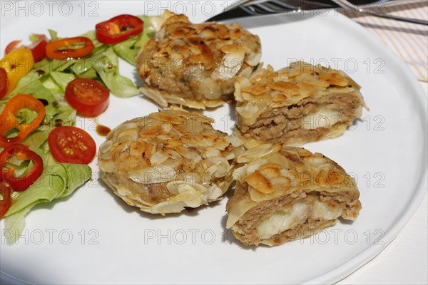 Swabian cuisine, meatballs wrapped in almonds, mixed minced meat, meatballs filled with cheese,