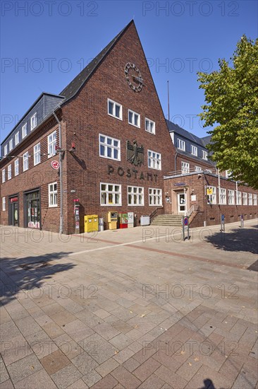 Post office against a cloudless blue sky in Bad Salzuflen, Lippe district, North Rhine-Westphalia,