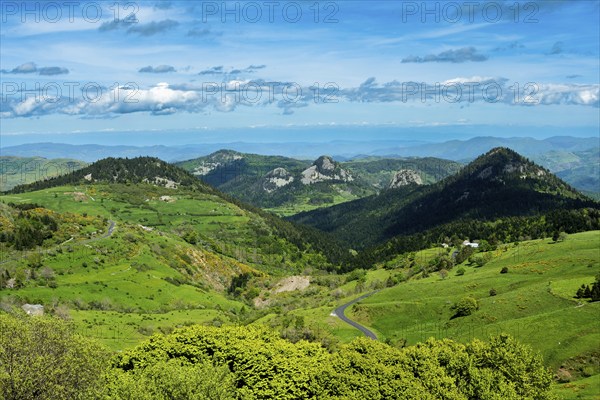 Scenic View of Dome-Shaped Volcanic Peaks (Sucs) in the Monts d'Ardeche Regional Natural Park.