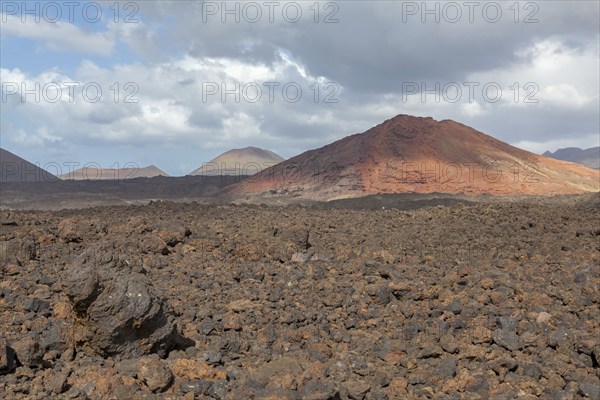 Lava field, volcanic landscape and fire mountains near Los Hervideros, Lanzarote, Canary Islands,