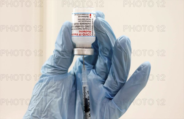 A syringe is infused with the active ingredient Moderna against Covid19, Schönefeld, 03/12/2021
