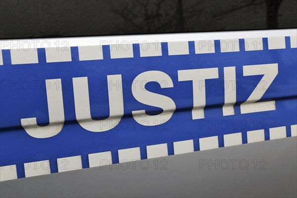 Justice lettering on the emergency vehicle of the German judicial authority