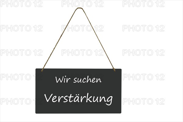 Freestanding sign with the inscription We are looking for reinforcement