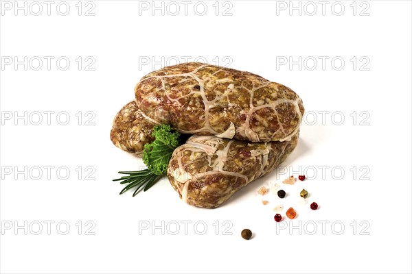 Traditional Cypriot Seftalia dish, raw, top view, on a white background, no people