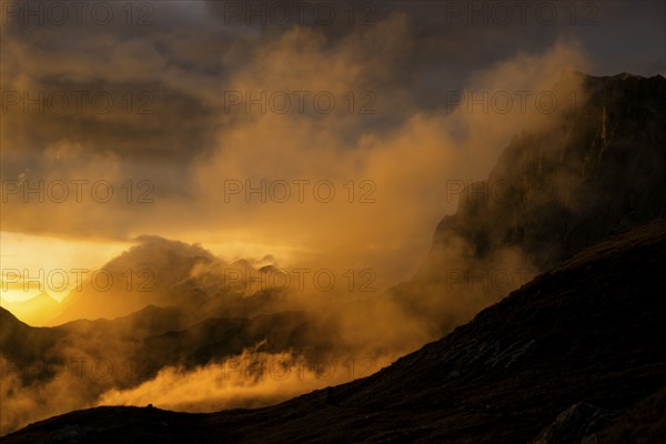 Montafon mountains with dramatic cloudy sky at sunset, Tschagguns, Rätikon, Montafon, Vorarlberg,