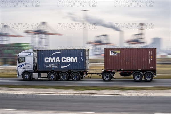 Container lorry, bringing containers to Euromax Container Terminal, the seaport of Rotterdam,