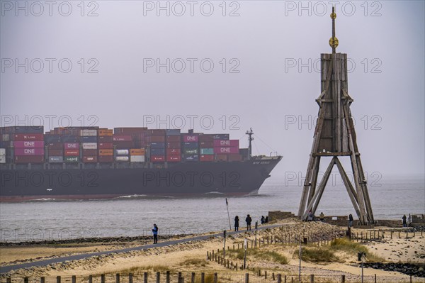 Thick fog in winter, hangs over the mouth of the Elbe into the North Sea, sea mark and landmark