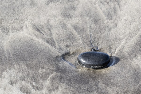 Lava pebbles on the beach, Playa de Famara, Lanzarote, Canary Islands, Spain, Europe
