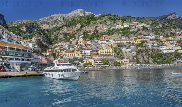 View from the boat of the village on the cliffs above the sea, Positano, Amalfi Coast, Amalfitana,
