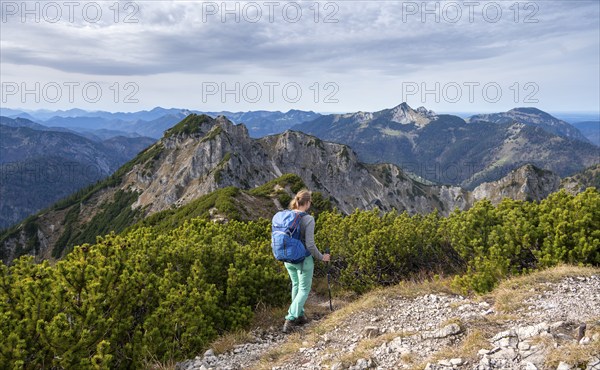 View over the mountain ridge of the Schindergebirge to the Bavarian Schinder, mountaineer on hiking
