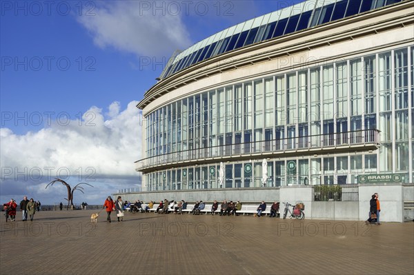 Casino-Kursaal and sculpture Dansende Golven, Dancing Waves on promenade in winter at seaside