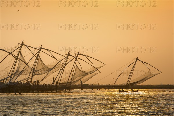 Chinese fishing nets, sunset, Arabian Sea coast, Fort Cochin, Kochi, Kerala, South India, India,