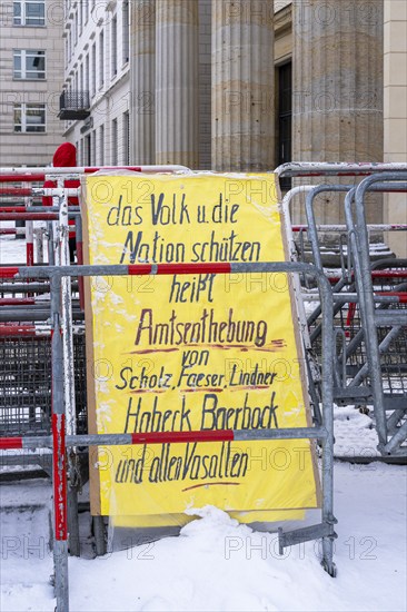 Demonstration, posters and barriers at the Brandenburg Gate, Berlin, Germany, Europe