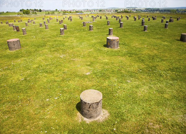 Concrete markers identify positions of the original wooden posts at the neolithic Woodhenge site,