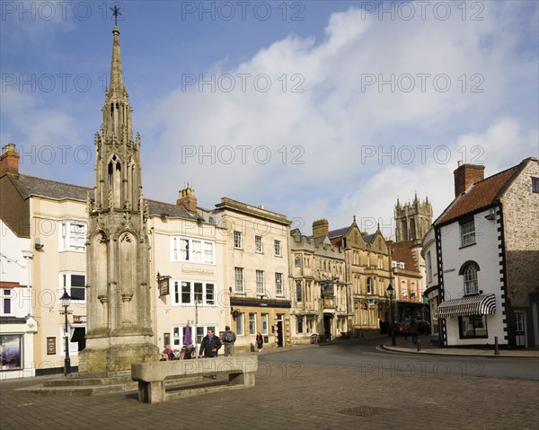 Crown Hotel and market cross in historic Market Place, Glastonbury, Somerset, England, United