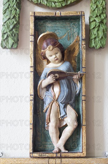 Painted plaster angels in village parish church of Saint Michael, Wilsford cum Lake, Wiltshire,