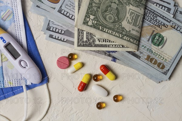 Georgian monetary currency, Lari, 20 GEL, medicine, thermometer, protective medical masks, concept,