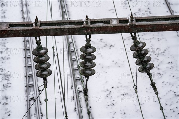 Onset of winter with lots of fresh snow and temperatures below -5 degrees during the day, railway