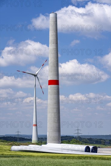 Wind farm near Brilon-Radlinghausen, new wind turbine being built, tower elements and rotors ready