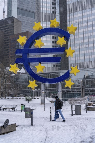 Winter in Frankfurt, euro sculpture at Willy-Brandt-Platz, snow-covered, Hesse, Germany, Europe