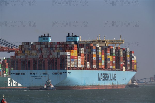 Container ship of the shipping company Maersk Line, Maastricht Maersk, leaving the harbour, towed