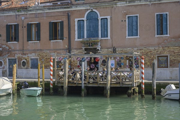 Restaurant on the canal, Murano, Venice, metropolitan city of Venice, Italy, Europe