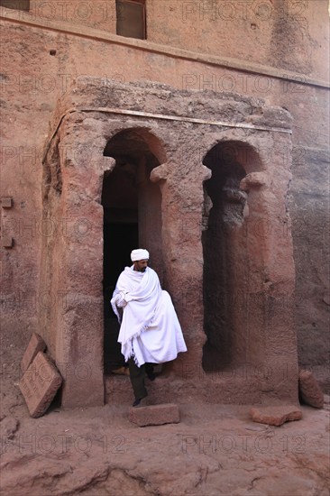 Rock churches of Lalibela, entrance to St Mary's Church and pilgrims, Bete Maryam, Ethiopia, Africa