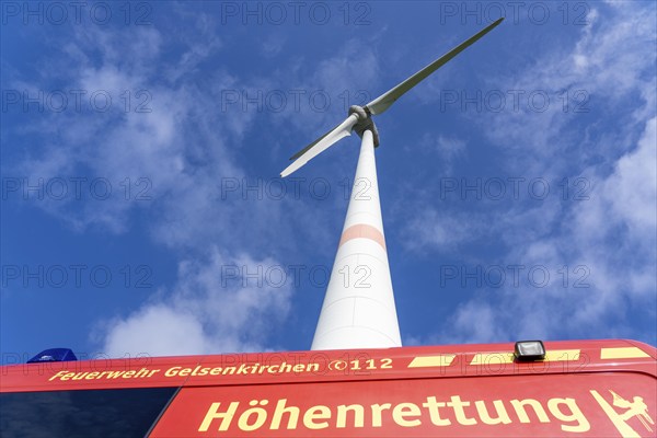 Height rescuers from the Gelsenkirchen fire brigade practise abseiling from a wind turbine from a