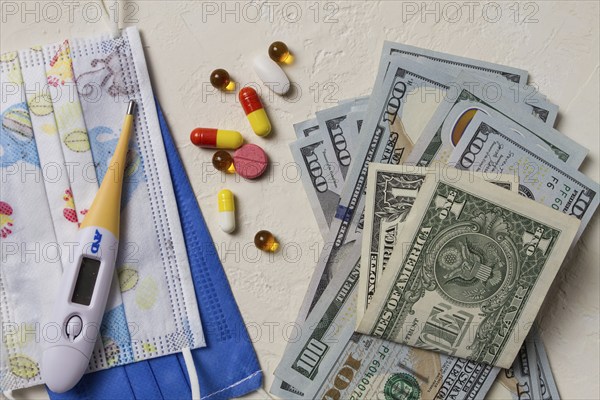 Georgian monetary currency, Lari, 20 GEL, medicine, thermometer, protective medical masks, concept,