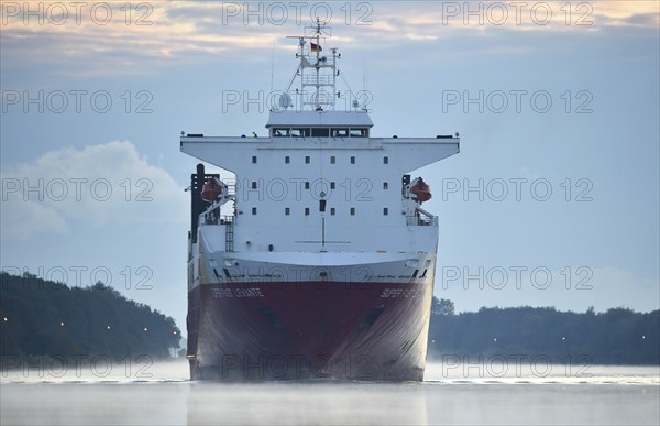 RoRo cargo ship Super Fast Levante travelling through the Kiel Canal at sunrise, Kiel Canal,