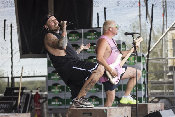 Matthias Engst (singer) and Chris Wendel (bassist) from the band Engst on the beach in front of the
