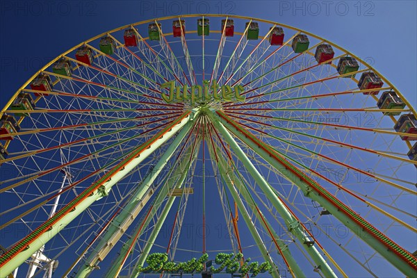 Jupiter Ferris wheel in the morning under a blue sky, Cranger Kirmes, Herne, Ruhr area, North