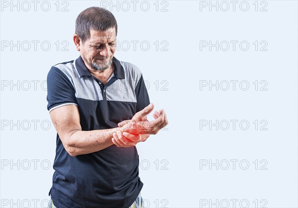 Senior man with arthritis in hands isolated. Elderly people with arthritis and hand pain