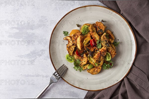 Salad, crispy eggplant in batter, with cherry, sesame seeds, olive oil, homemade, no people
