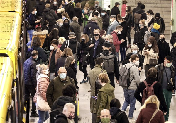 Berlin Alexanderplatz underground station, passengers with masks, 19 October 2020
